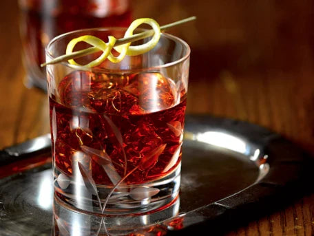 Vieux Carre cocktail in rocks glass with lemon twist garnish representing classic New Orleans French Quarter drink
