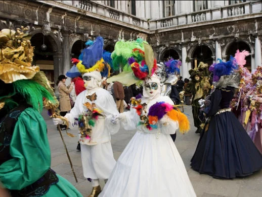 people in elaborate Venetian masks and costumes at Venice Carnival in Italy showcasing traditional masquerade celebration